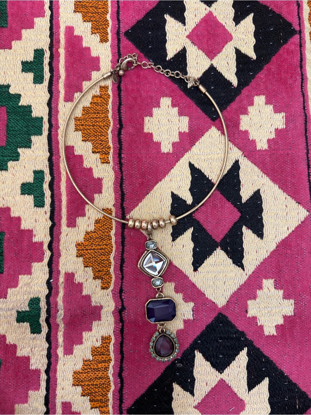 Gold Tone Necklace with Purple and Clear Stone Pendant
